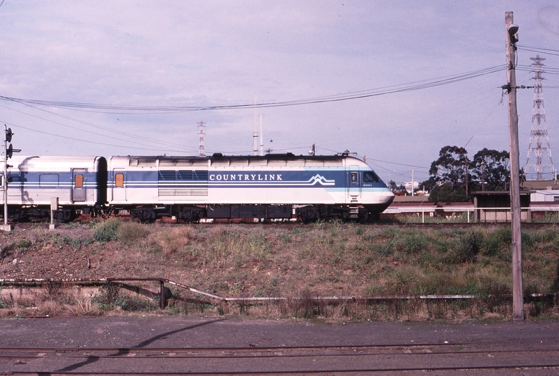 120444: North Melbourne near Contrans Siding 8611 Down Daylight XPT to Sydney XP 2011 leading XP 2010 trailing