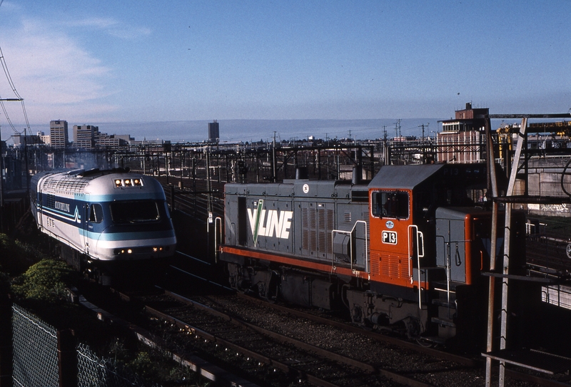 121135: North Melbourne Flyover 8611 Daylight XPT to Sydney XP 2004 leading and Light Engine P 13