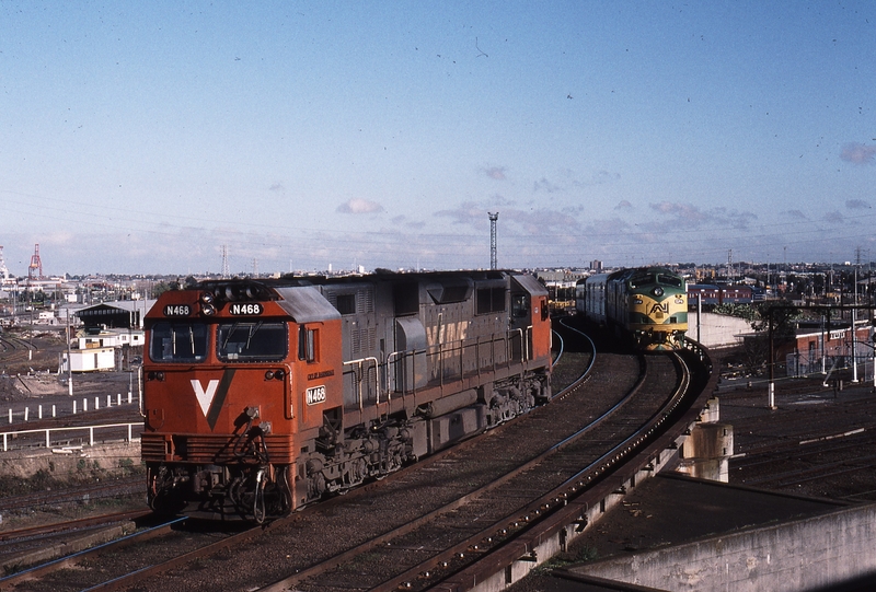 121139: North Melbourne Flyover Light Engine N 468 and 8703 Down Empty Cars CLP 14 trailing