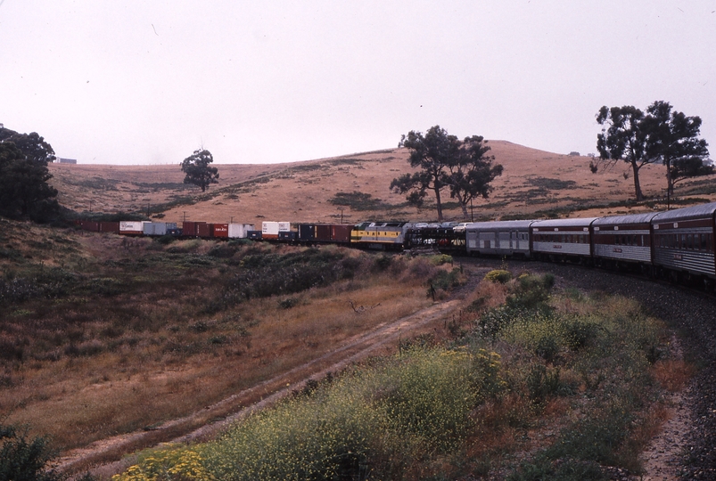 121328: Tunnel down side km 40 Yantaringa Curve Adelaide Hills Up Overland Express CLP 15 assisting Up NR Freight