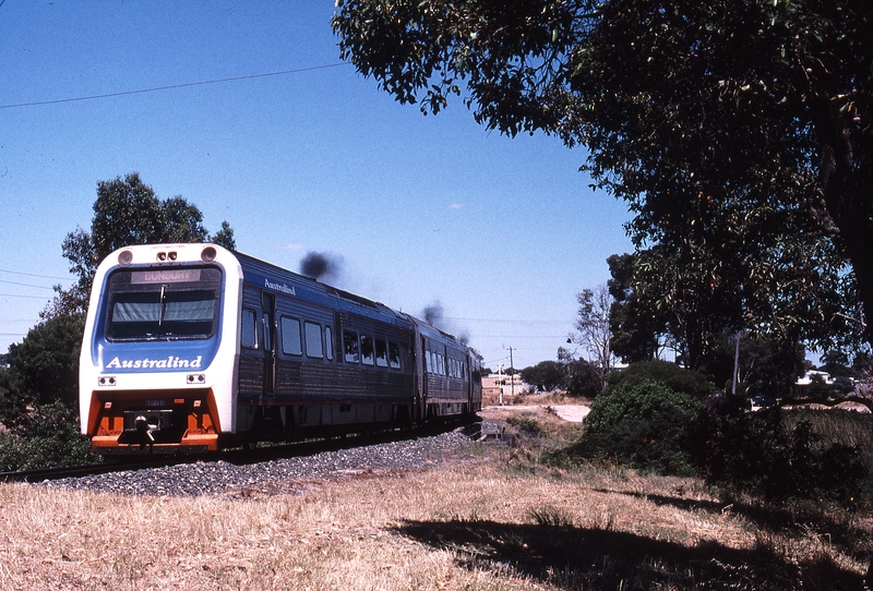 121449: Morrissey Street Level Crossing down side Down Australind Empty Cars ADP 103 leading