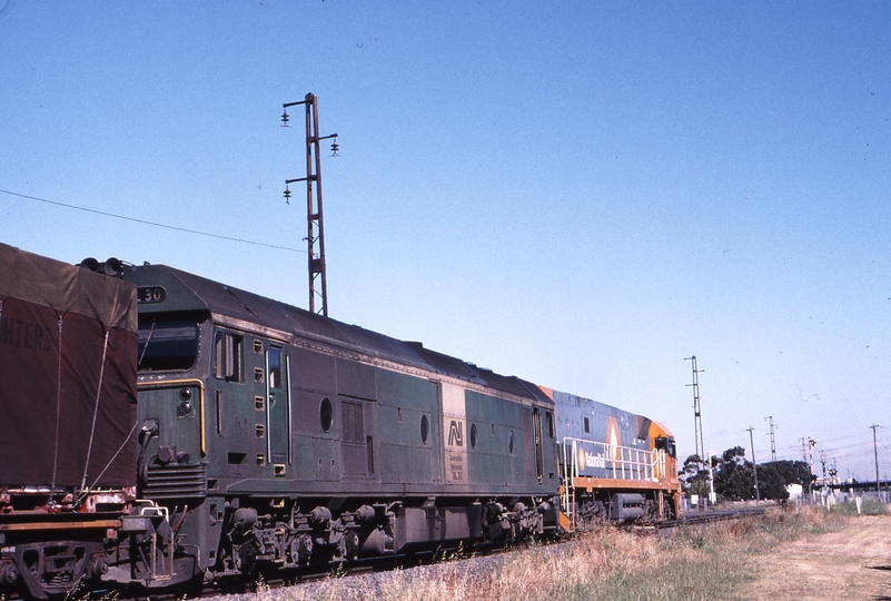 122033: Kernot Street Level Crossing down side 9702 Superfreighter to Adelaide NR 81 BL 30