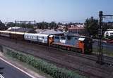 122130: West Footscray 8019 Bendigo Passenger Murray Club and Norman in consist N 462