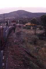 122777: Level Crossing midway in Woolshed Flat Saltia Section Southbound Work Train T 186 Unloading rails