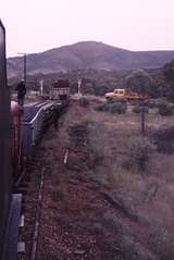 122778: Level Crossing midway in Woolshed Flat Saltia section Southbound Work Train T 186 Unloading rails