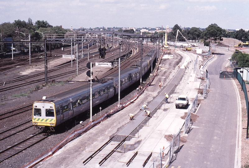 123246: Tennis Centre Footbridge Up Suburban 6-car Comeng