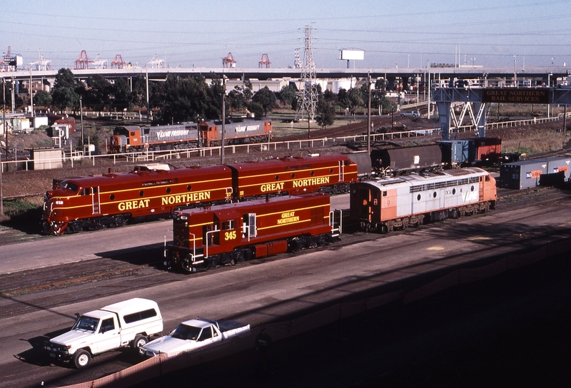 123666: GNRS Depot North Melbourne T 345 S 317 (bg), GM 27 GM 22 (sg), In background X 49 G 523