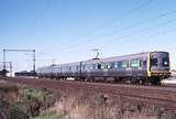 123679: Maddox Road Level Crossing Down Suburban 3-car Comeng 383 M leading