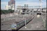 124543: Exhibition Street Bridge Down Pakenham Suburban 6-car Hitachi 60 M leading