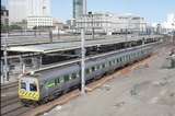 124574: Spencer Street Bourke Street Footbridge Down Empty Cars 3-car Comeng 386 M leading