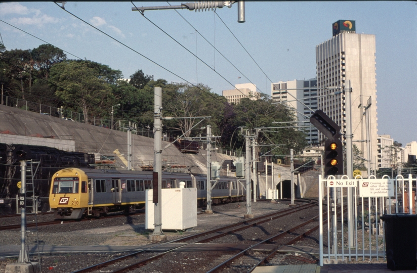 125159: Roma Street 4:20pm Shorncliffe Suburban departing Set 210 trailing