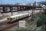 125626: Wellington opposite Ferry Terminal 1:00pm Suburban from Plimmerton ET 3442 trailing