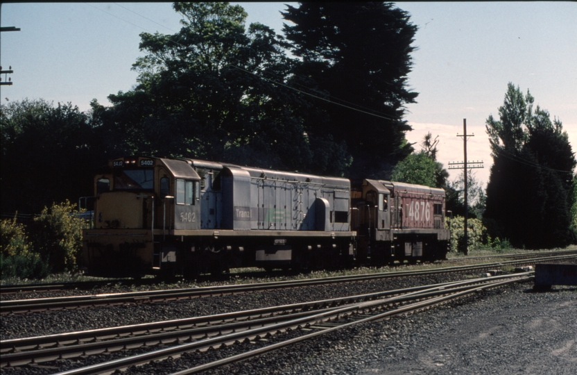 125732: Middleton Yard Annex Road Level Crossing Southbound Light Engines DC 4876 DX 5402