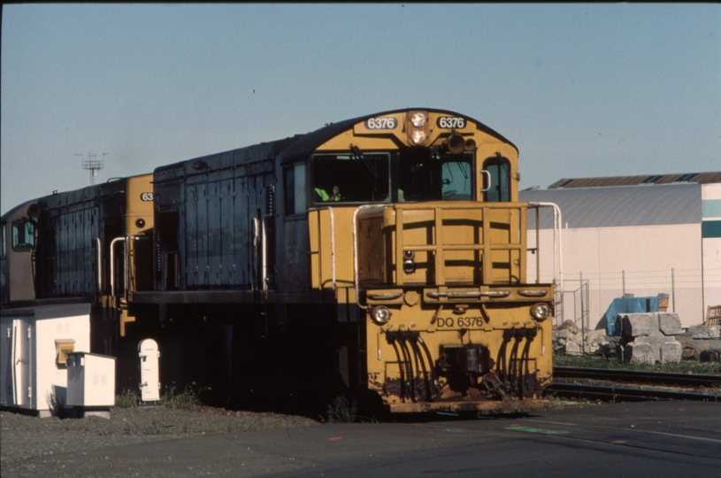 125737: Middleton Yard Annex Road Level Crossing Southbound Light Engines DQ 6376 (DQ 6347),