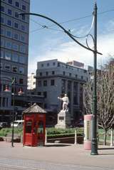 125777: Chch Tramway Worcester Boulevard at Avon River Bridge Polar Explorer Scott Statue in background