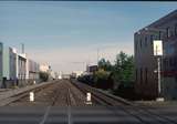 125832: Gasson Street Level Crossing km 10 38 Lyttelton Line looking West through site of former Chch Yd