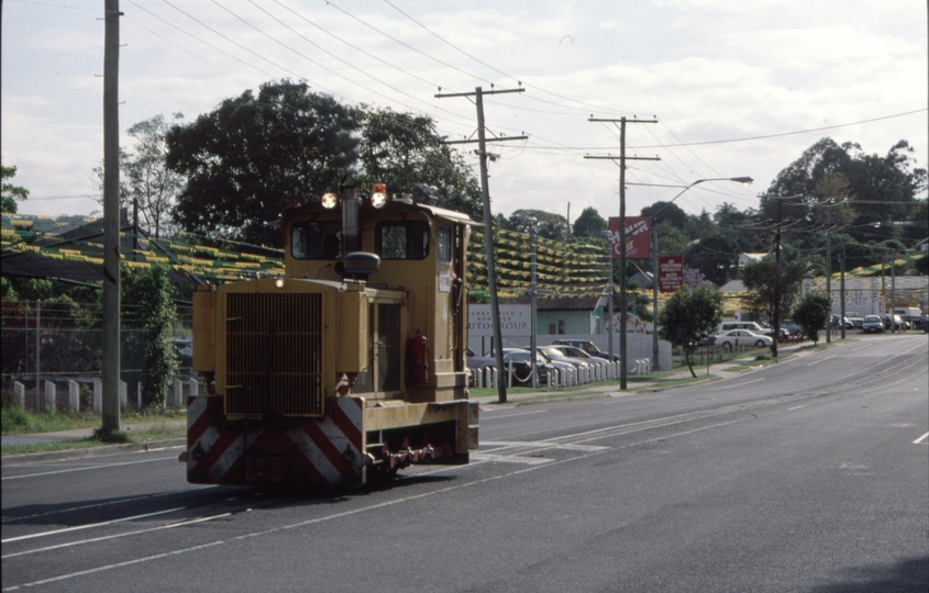 127105: Nambour Mill Howard Street at James Street Outbound Light Engine 'Petrie'