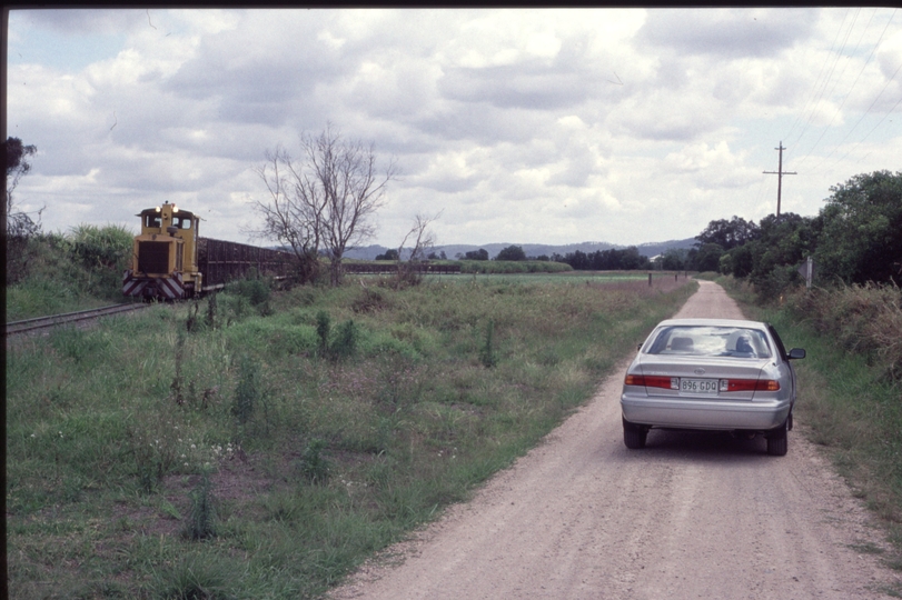 127112: Nambour Mill River Store Road South end Loaded Cane Train 'Bli Bli' leading