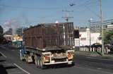 127145: Nambour Mill Howard Street East end Road vehicle carrying empty cane bins