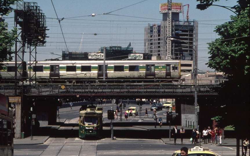 127186: Flinders Street Viduct at Queensbridge Northbound Route 55 Z3 152 and 417 M nearest on MTrain Comeng Suburban Train