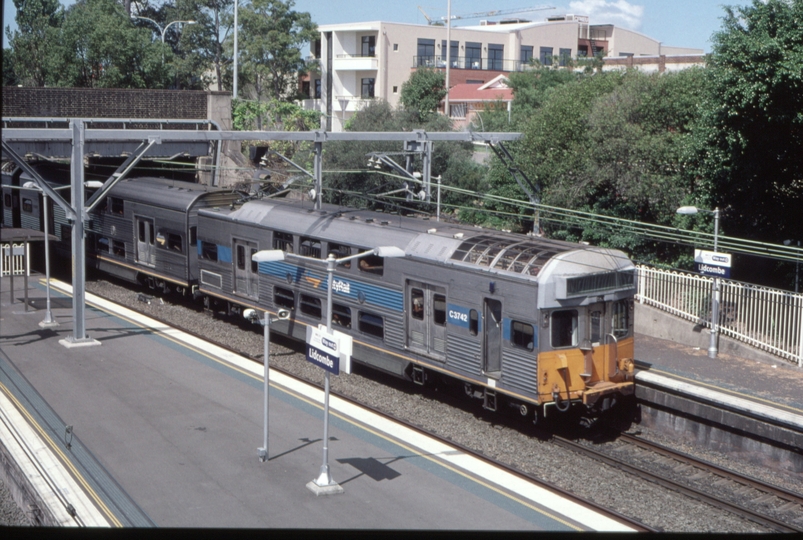 127311: Lidcombe Down Suburban C 3742 leading