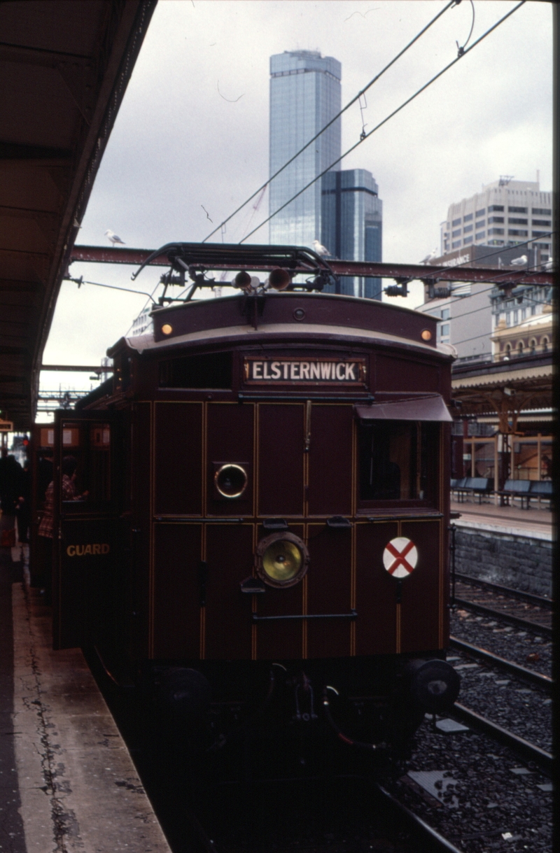 127561: Flinders Street 7585 Elecrail Special 107 M leading