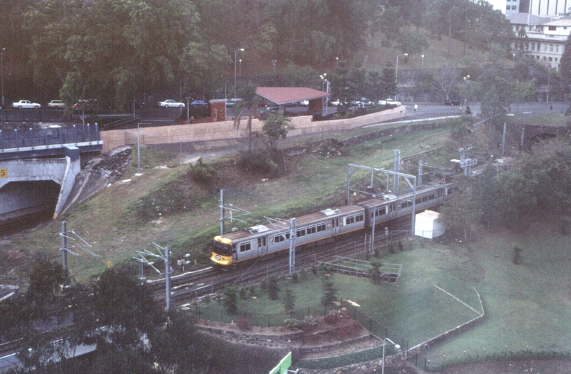 127692: Roma Street 02 Suburban Train entering tunnel viewed from 'Holiday Inn'