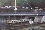 127714: Roma Street Suburban Train entering new tunnel viewed from'Holiday Inn'