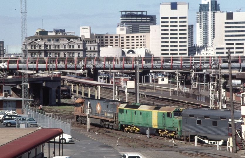 127826: Latrobe Street Bridge Down 'Overland' Empty Cars NR 87 DL 48 trailing