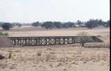 128268: Burrumbuttock (up side), Bridge viewed from South to North across line