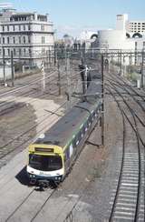 128317: Collins Street Bridge 440 M leading 6-car MTrain Suburban to Cranbourne