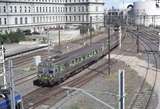 128319: Collins Street Bridge 32 M leading 6-car Connex Hitachi Suburban Train to Glen Waverley