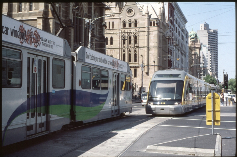 128390: Flinders Street at Swanston Street Westbound Porto 018 and Eastbound B2 2040