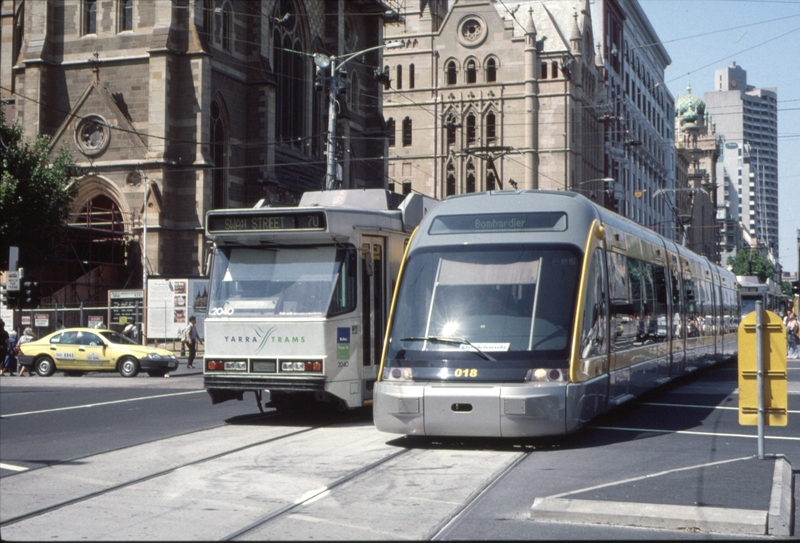 128391: Flinders Street at Swanston Street Eastbound B2 2040 and Westbound Porto 018