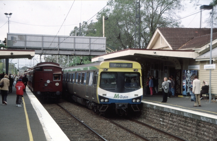 128549: Murrumbeena 301 M leading Up MTrain Comeng Suburban 7505 Down Elecrail Special in distance