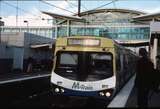 128700: Dandenong Up Suburban 6-car MTrain Comeng Reg Topp on opposite platform