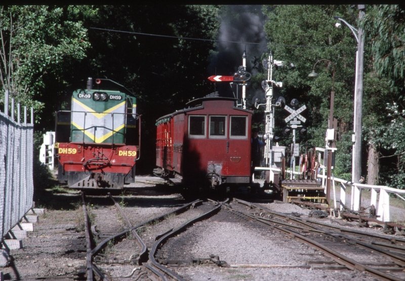 129586: Belgrave DH 59 stabled and shunting train Workshop Extension Worksite at left