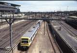 130133: Spencer Street 899 M leading 6-car X'Trapolis Suburban emerging from Burnley Lines Tunnel