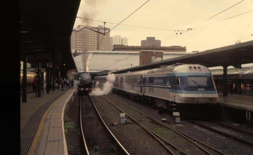 130793: Sydney Central Platforms 3 and 4 7:53am Special to Gosford 3801 and Down XPT XP 2002 leading