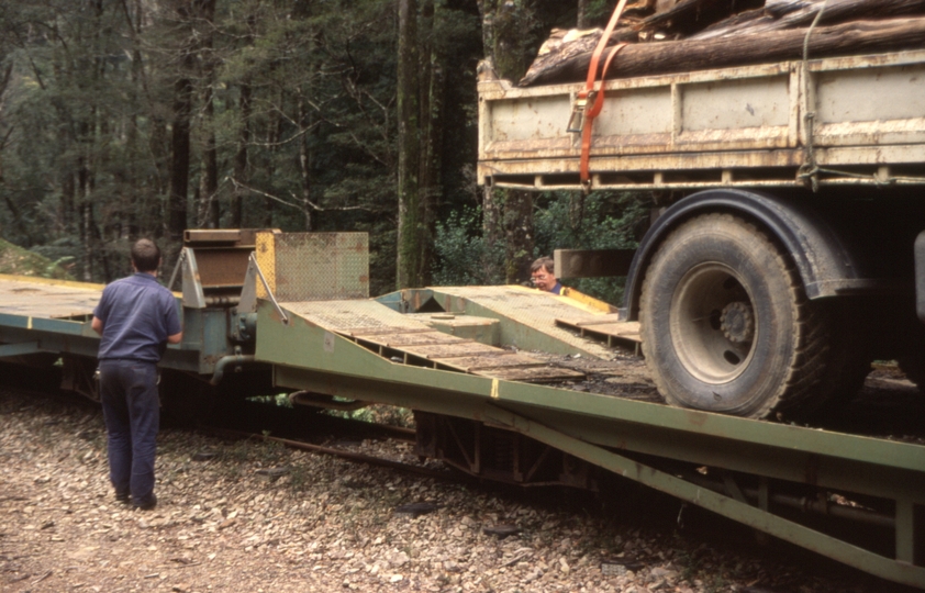 131273: Lower Landing Loading Forestry Tasmania Road Vehicles on to Goods Train