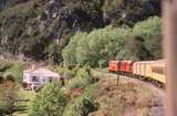 131624: Approaching Parera Taieri Gorge Railway Passenger to Middlemarch De 504 Dj 1240 and former railway house