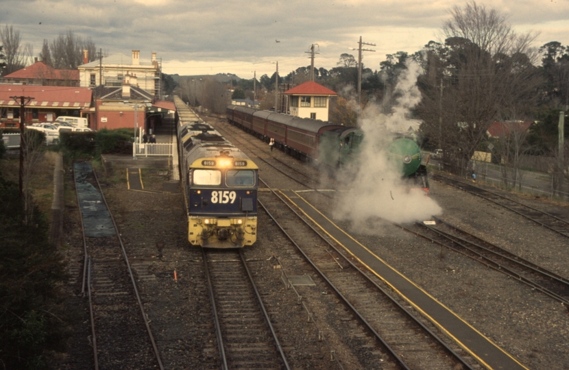 132213: Moss Vale Northbound Limestone Train 8159 and Stabled NSWRTM Special 3801