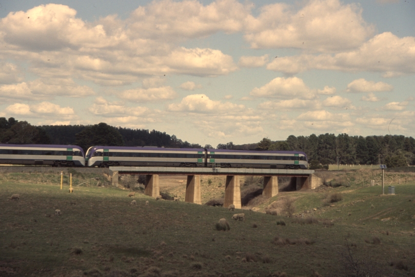 132357: km 85 Ballarat Line Paddock Creek Bridge Passenger to Southern Cross 6-car V'Locity