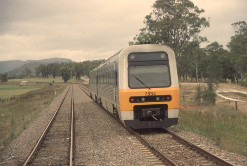 132489: Wallarobba 9:58am Suburban from Dungog 2852 trailing