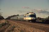 132910: Bowser (down side), 3 Chain Road Level Crossing Day XPT to Melbourne XP 2007 leading