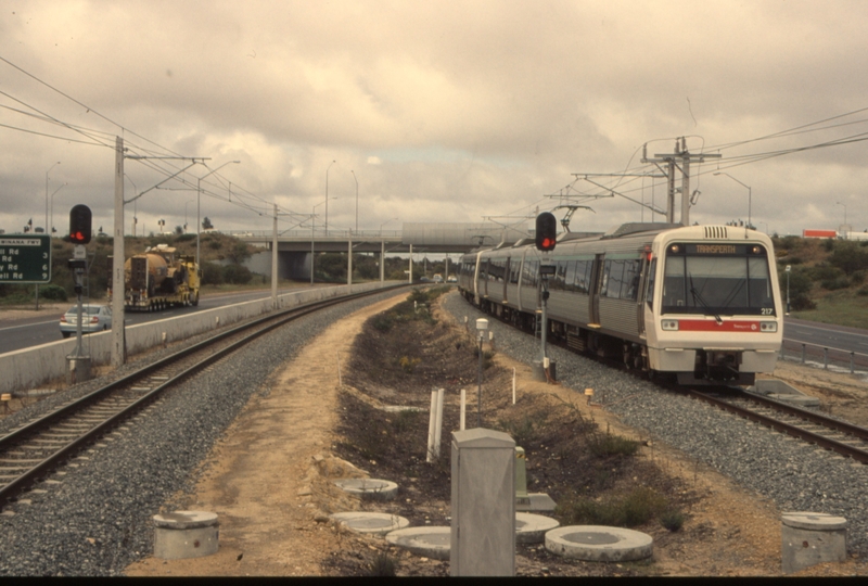 132997: Cockburn Central Suburban from Perth 4-car 'A' Set 217 leading