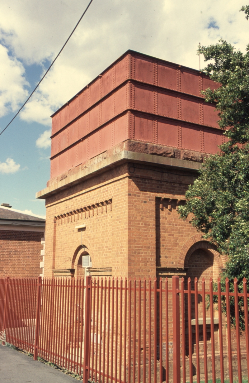 133241: Elmore Locomotive Water Tank at rear of platform