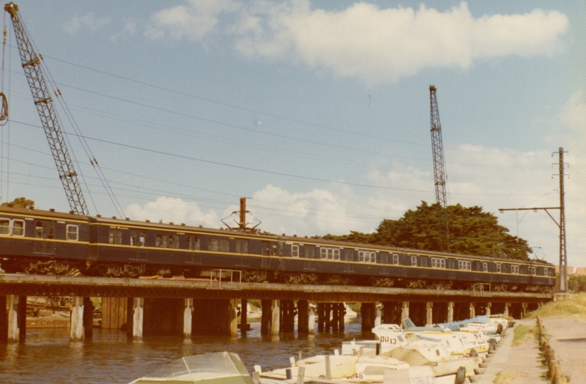 133765: Mordialloc Creek Bridge 7-car Harris Train on trestle bridge -1