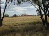 135236: Bridge km 678 Central Line Down Queensland 150th Anniversary Special BB 18 1079 1620