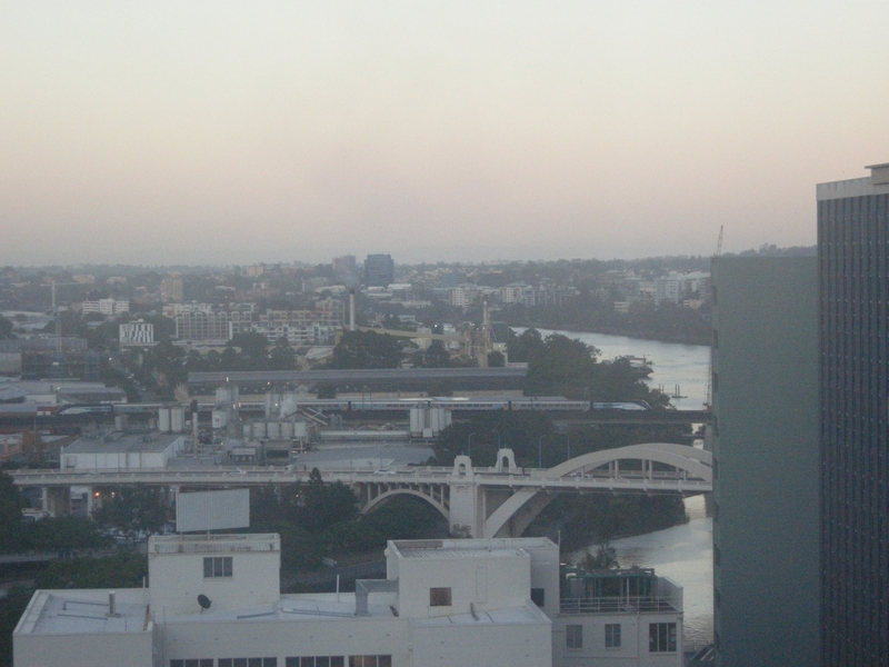 135279: South Brisbane Overnight XPT from Sydney XP 2011 leading XP 2006 trailing taken from Hotel Room